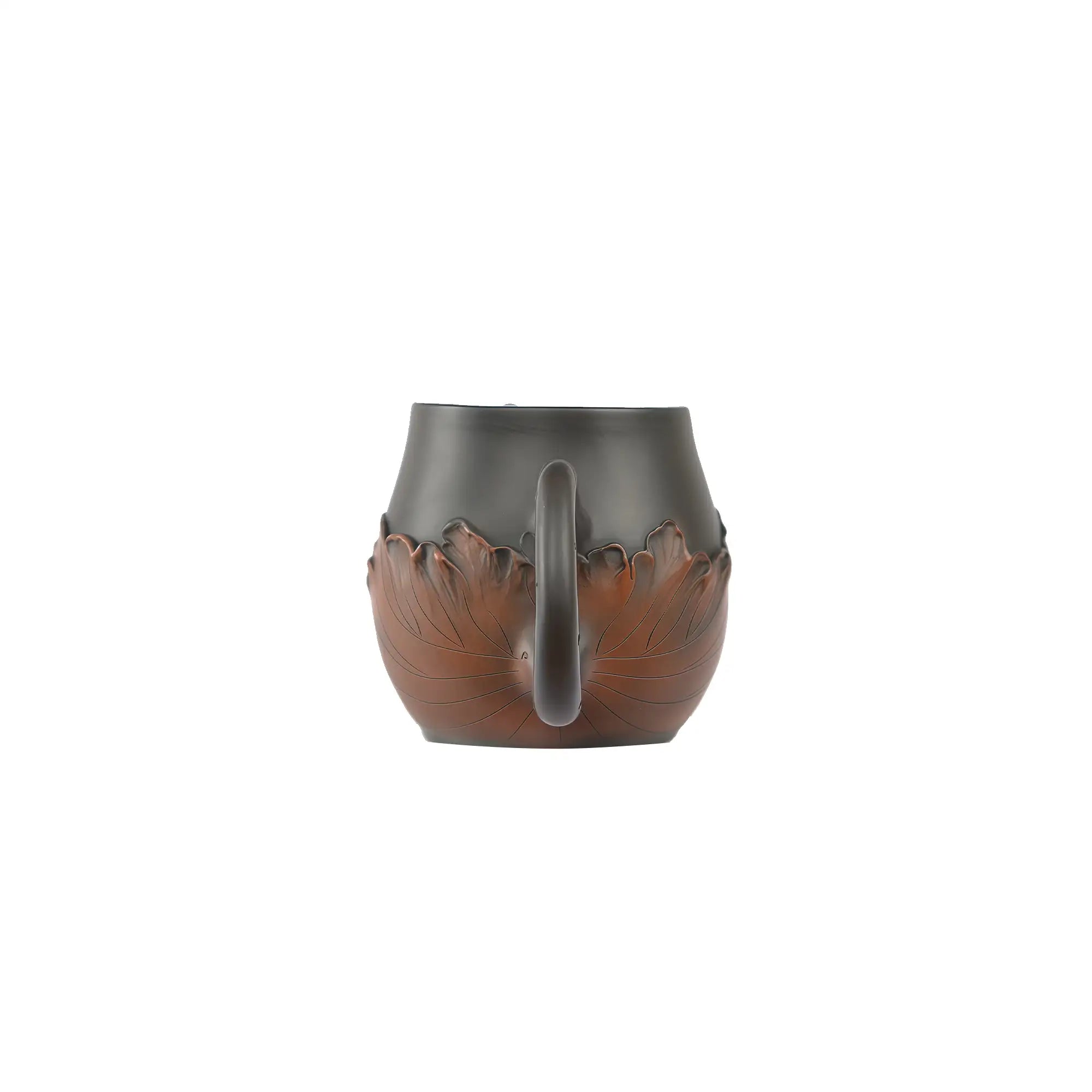 Back view of a Jianshui zitao fairness pitcher showing the curved handle and lotus leaf relief carving