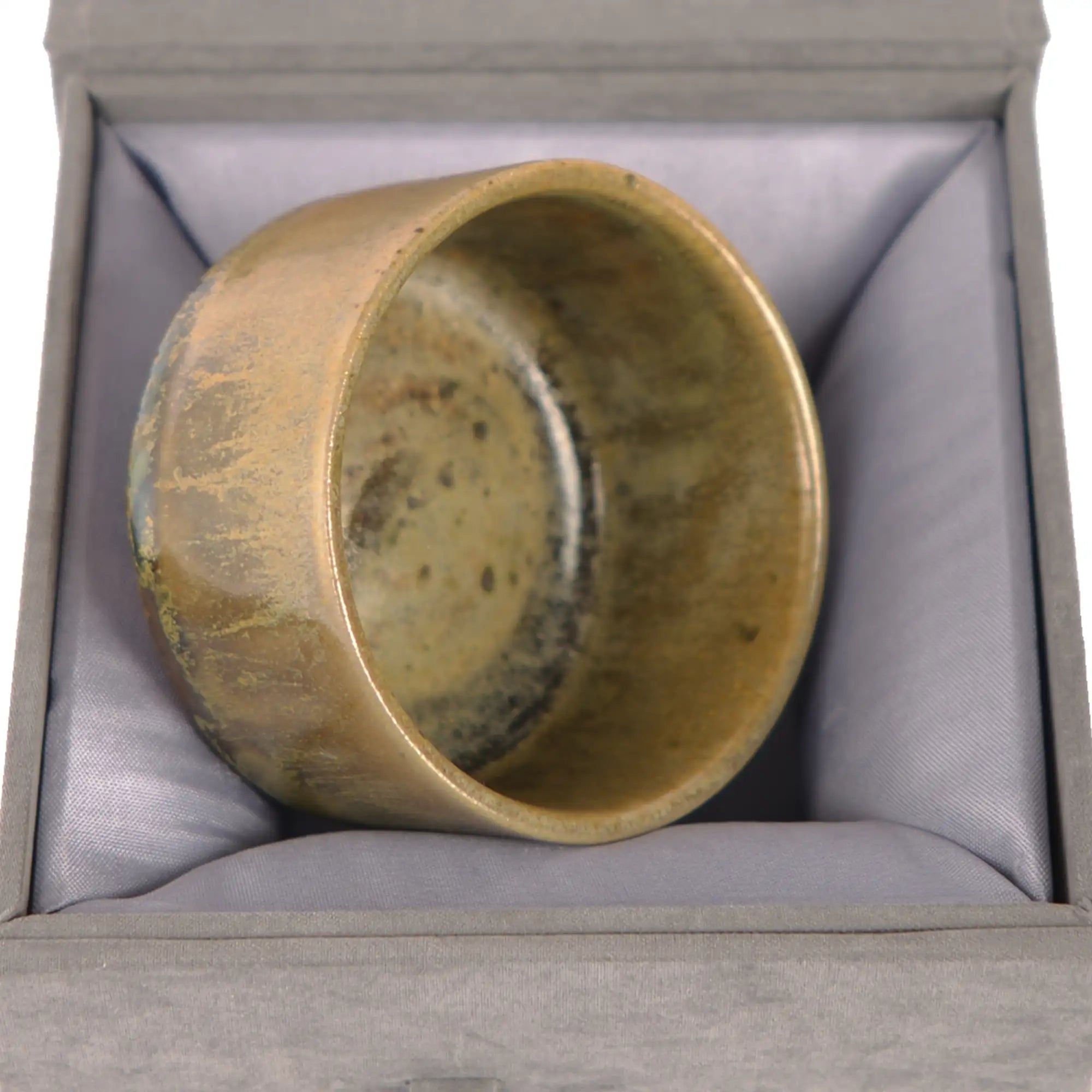Wood-fired Jianshui zitao tea cup presented in a protective gift box for storage and display