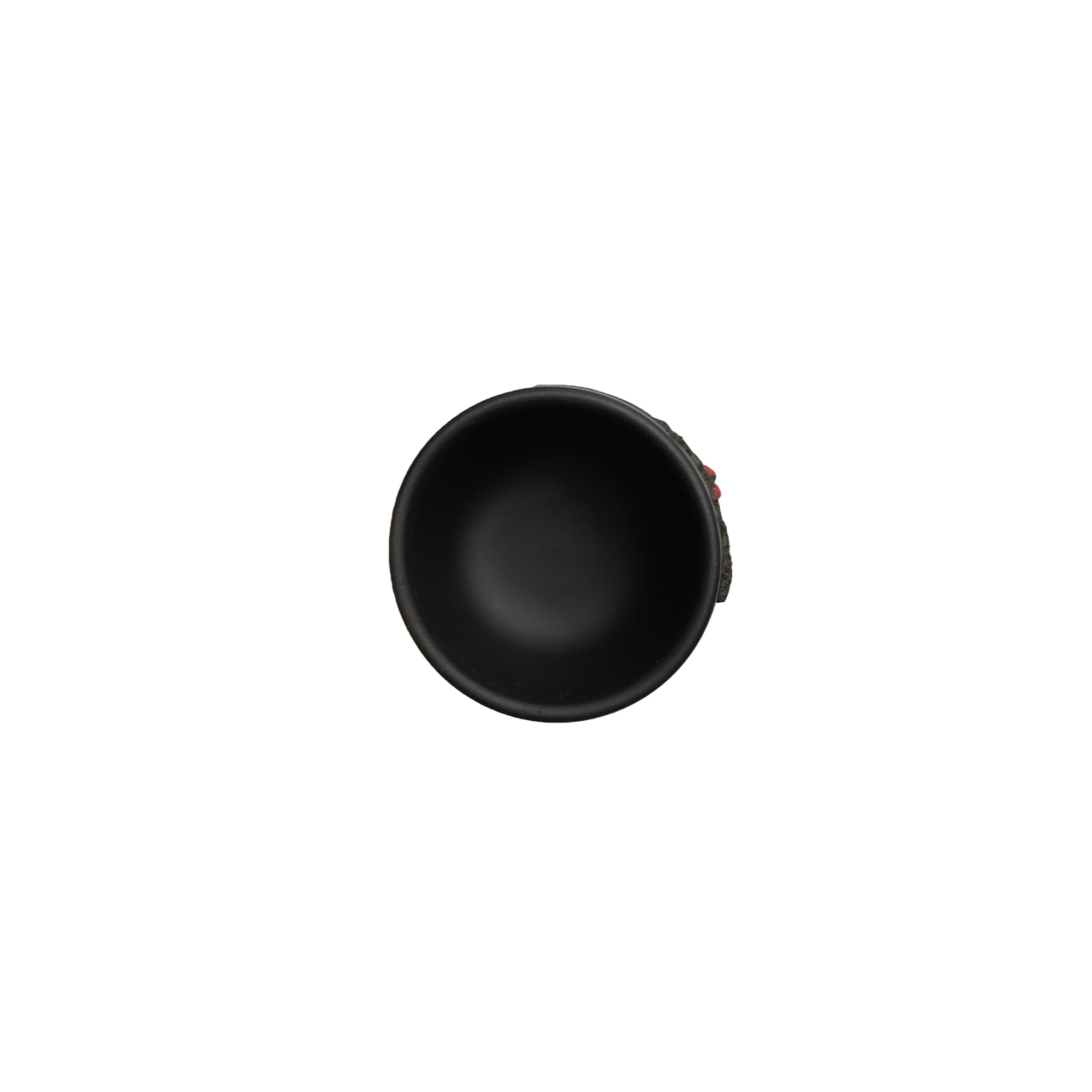 Top view of a Jianshui zitao master tea cup showing the smooth unglazed interior