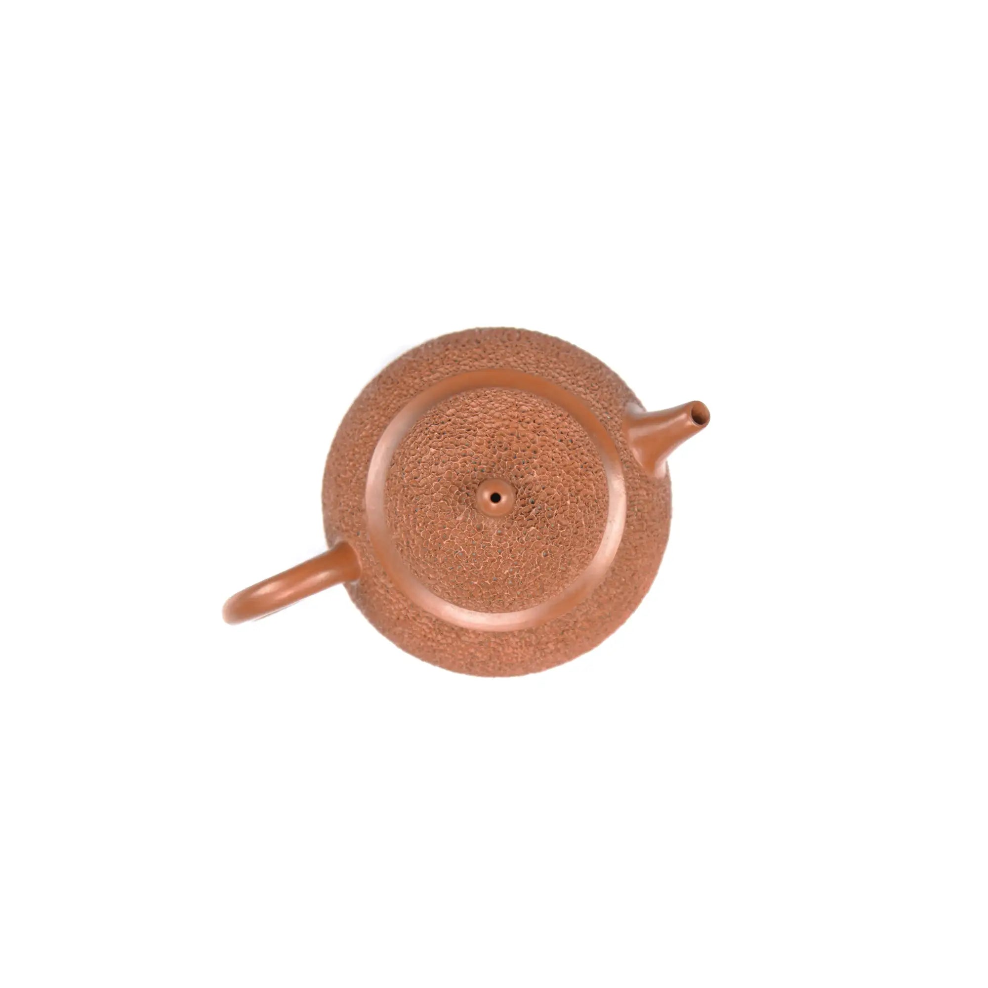 Jianshui zitao red clay teapot, top view showing lid and spout alignment.