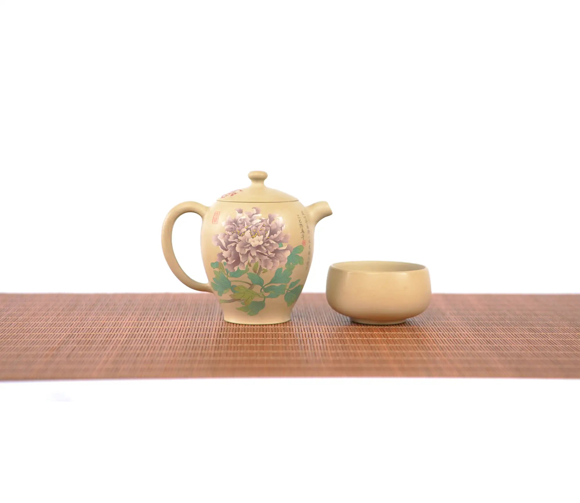 Handcrafted white clay peony teapot set, featuring a hand-painted floral teapot and matching tea cup.