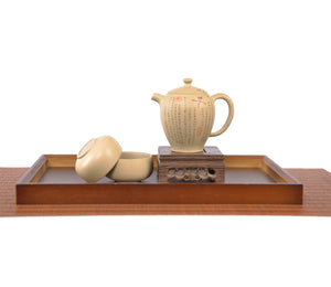 Handcrafted white clay peony teapot set, featuring a calligraphy-decorated teapot displayed on the back with two matching cups. 