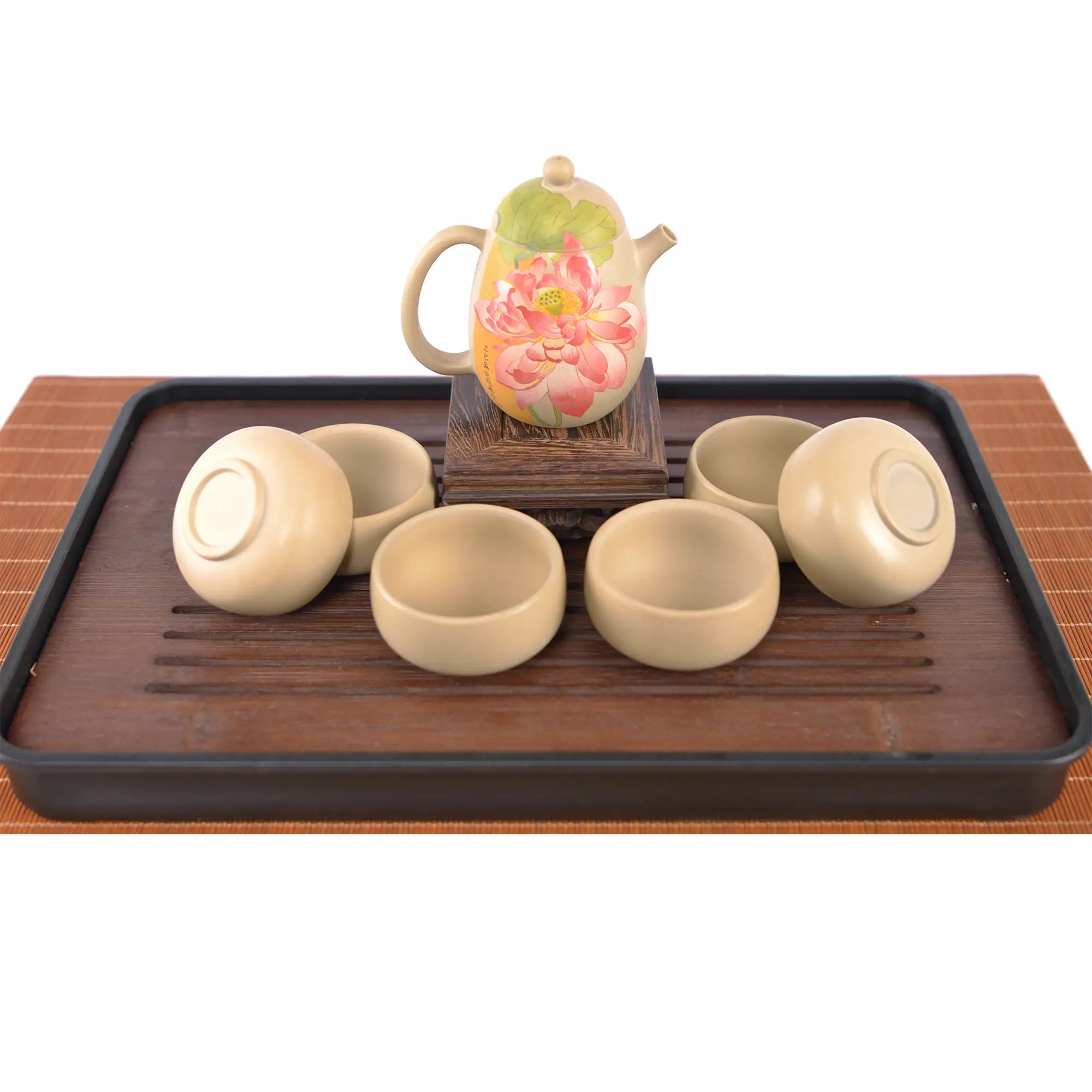 Handcrafted white clay lotus teapot set with six matching cups, featuring a hand-carvd lotus floral design.