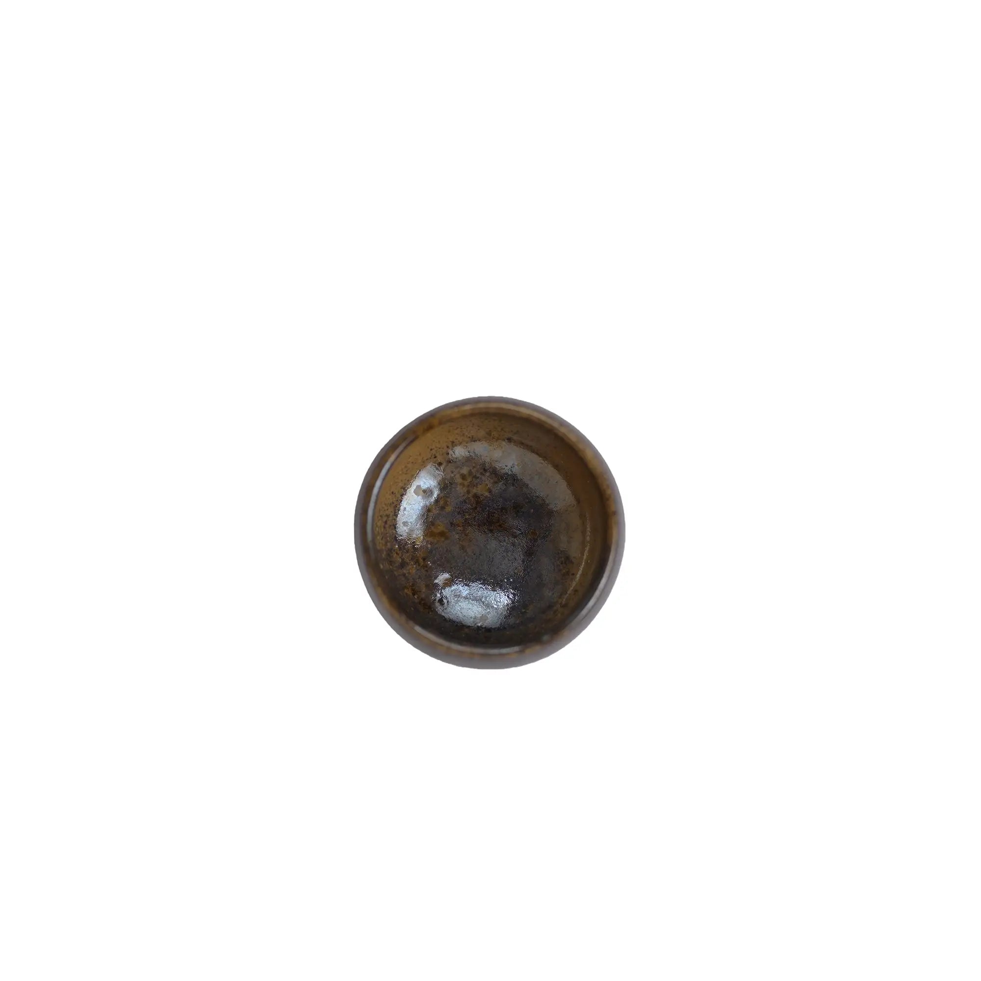 Jianshui zitao wood-fired cup, top view highlighting the kiln-softened rim