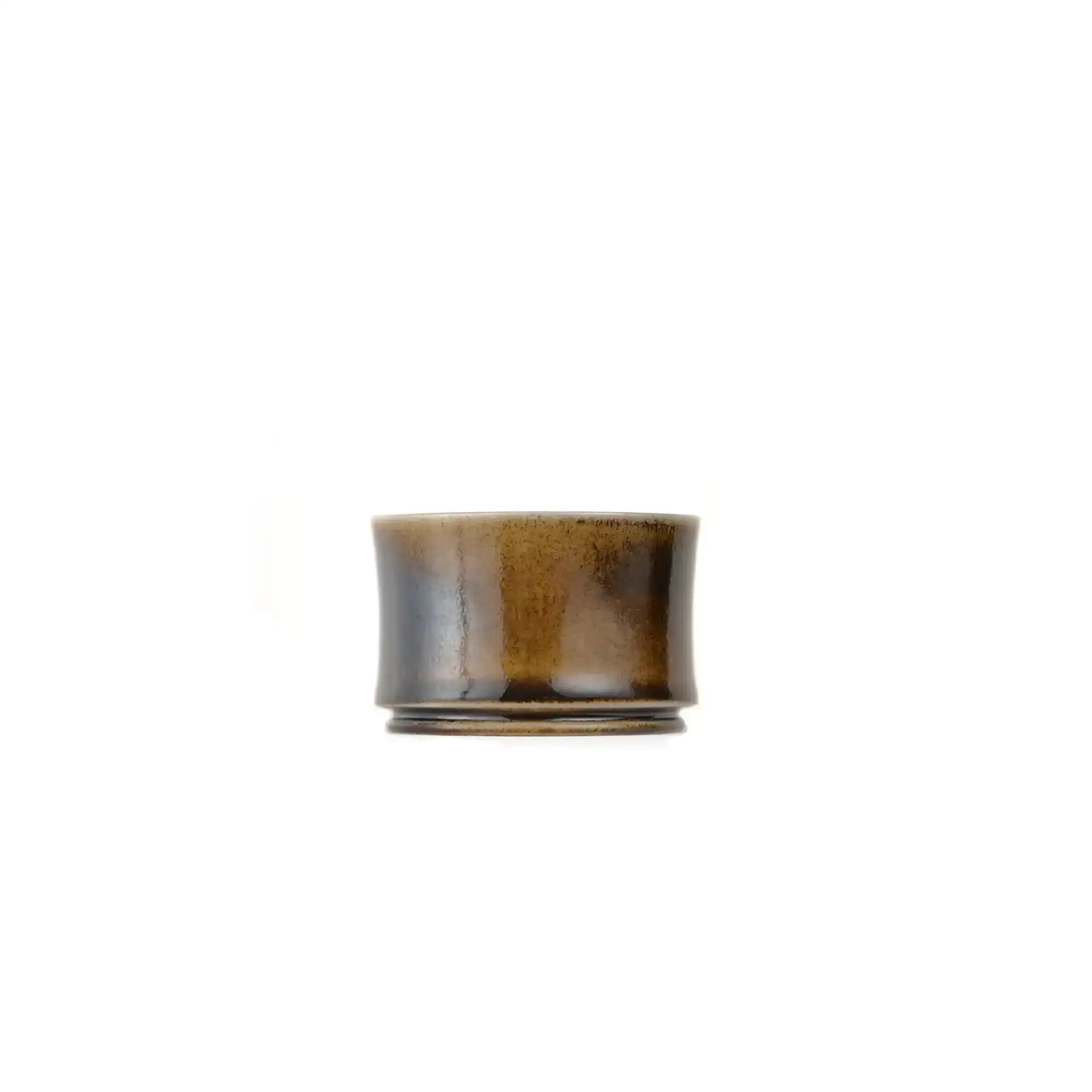 Jianshui zitao wood-fired cup featuring a raw unglazed surface with subtle natural variation, side view