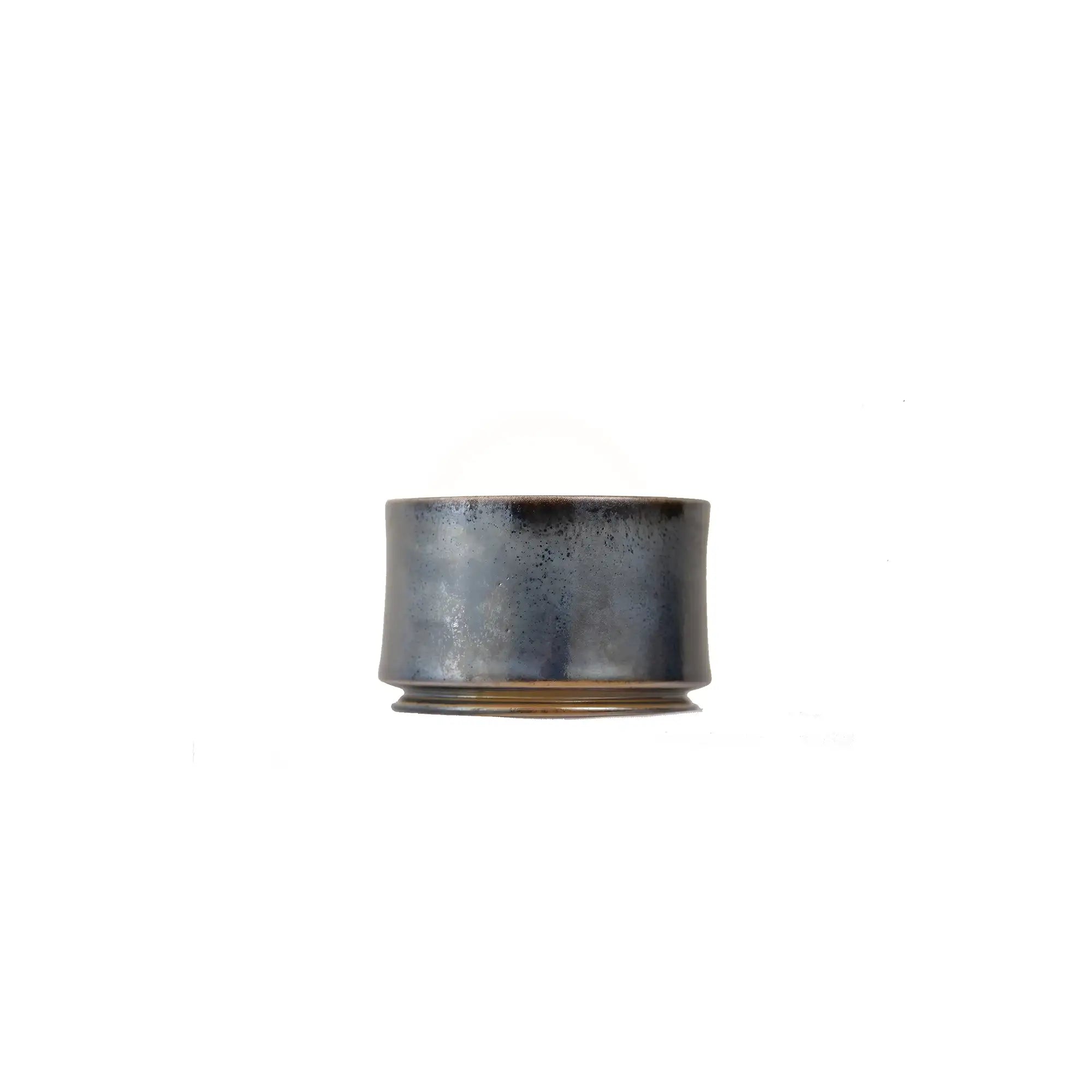 Jianshui zitao wood-fired cup featuring a plain unglazed surface with organic character, side view