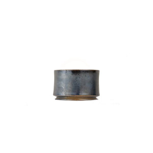 Jianshui zitao wood-fired cup featuring a plain unglazed surface with organic character, side view