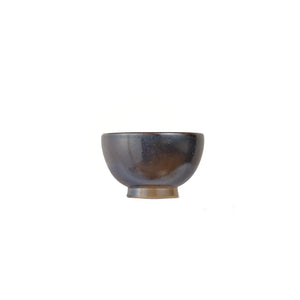 Jianshui zitao wood-fired cup showing depth of tone created by prolonged kiln firing, side view