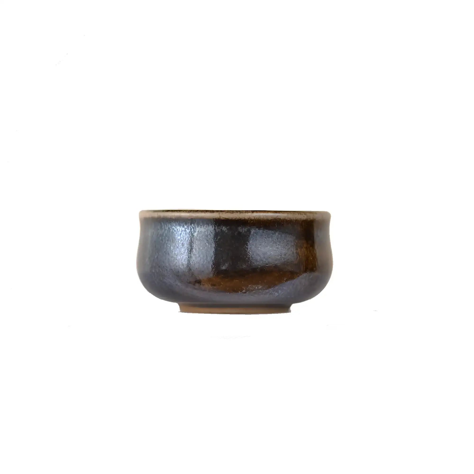 Jianshui zitao wood-fired cup featuring unglazed surface with organic texture, side view.