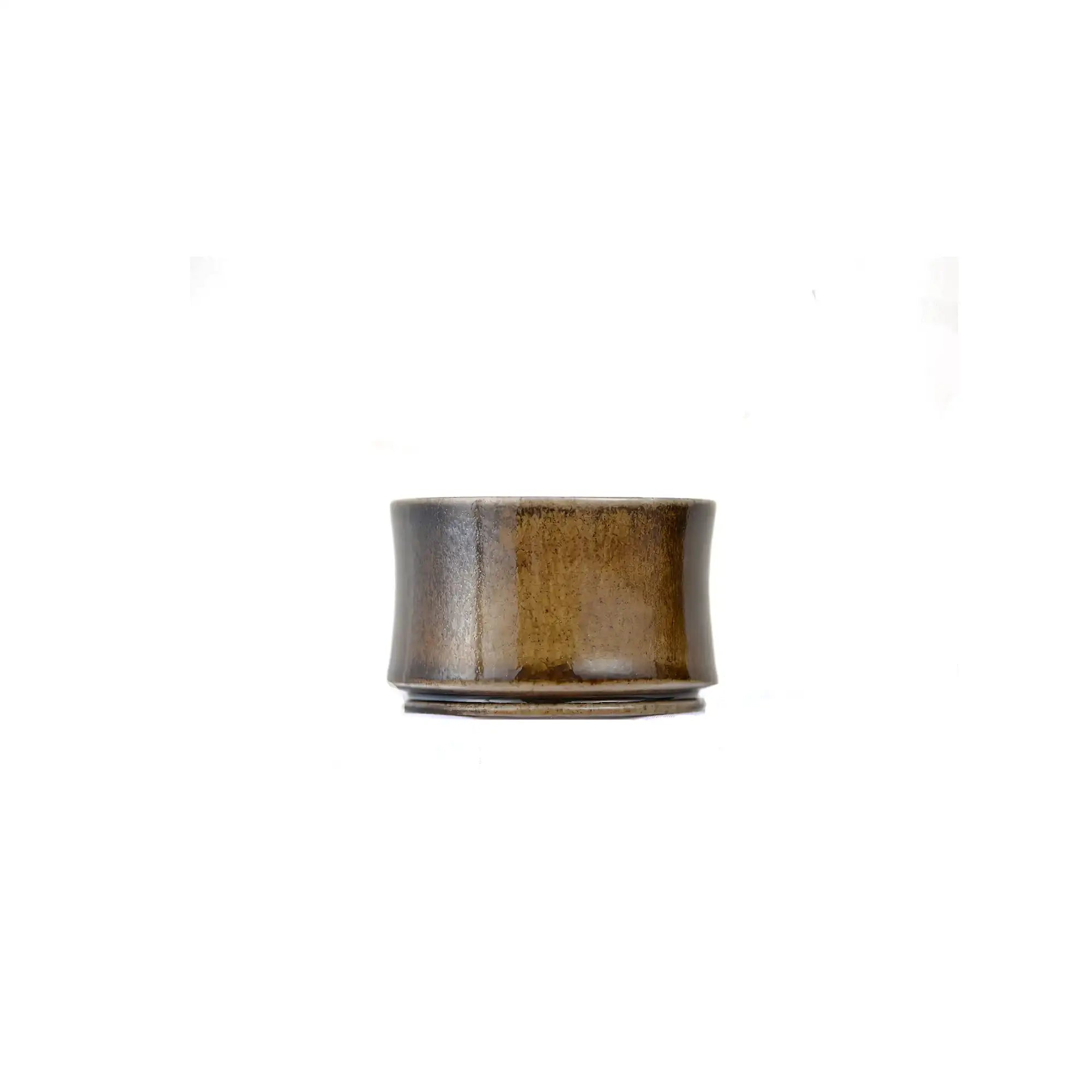 Jianshui zitao wood-fired cup with vertically settled ash tones formed during firing, side view