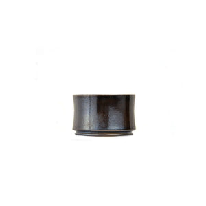 Jianshui zitao wood-fired cup showing banded tonal variation shaped by kiln atmosphere, side view